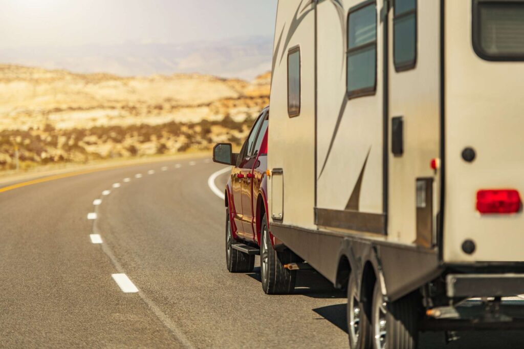 Camper Being Pulled Down the Road